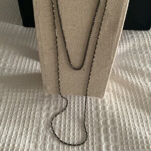 Two Designer Silver Designed Necklaces. One 36”The Other is 23”Tarnished Silver.